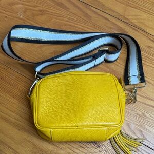 Vibrant Yellow Crossbody Bag with Striped Strap
